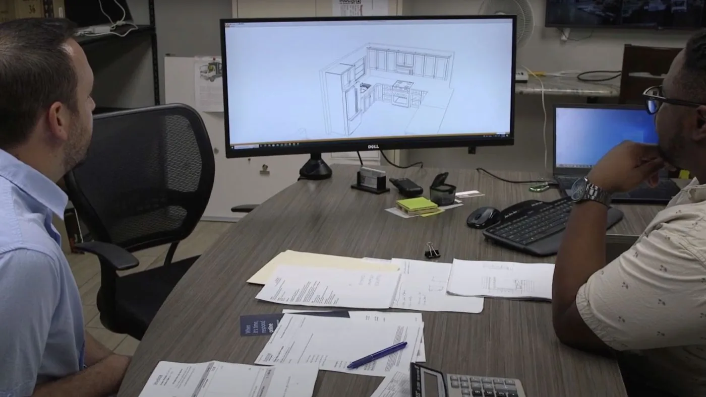 Designers working on a 3D kitchen design