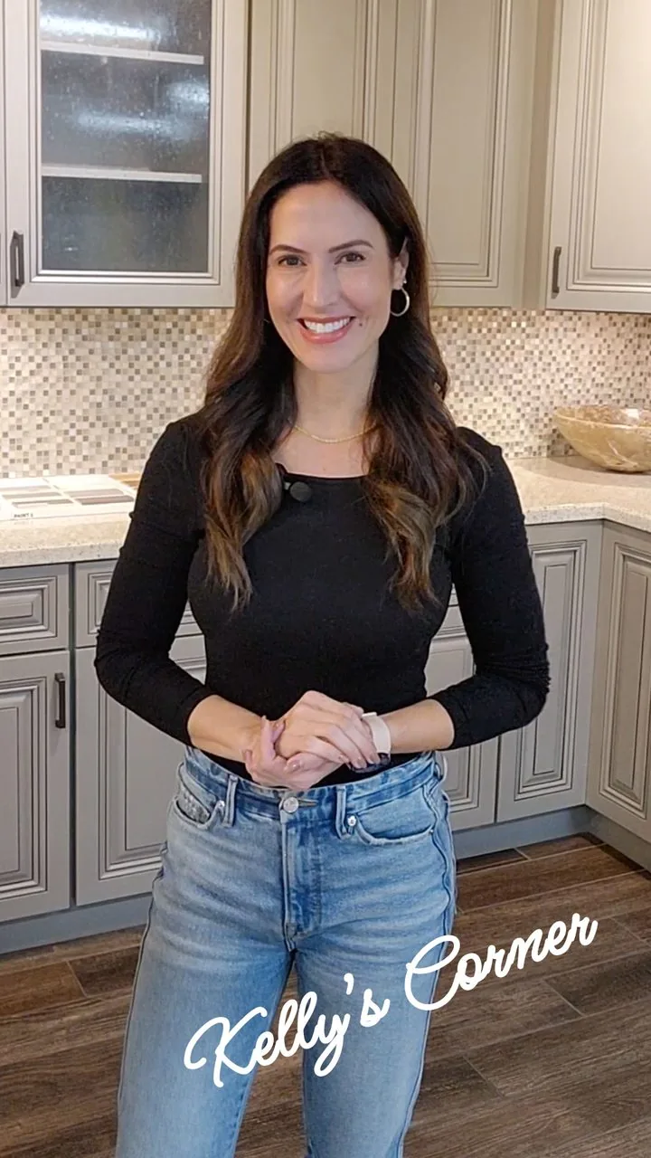 Kelly from Superior Stone & Cabinet in a showroom kitchen
