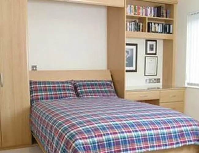 A hideaway bed is a great option for a small room.
