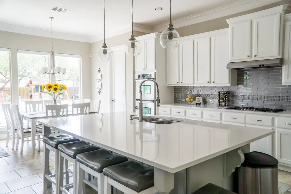 White kitchen cabinets paired with quartz countertops in a Phoenix kitchen remodel