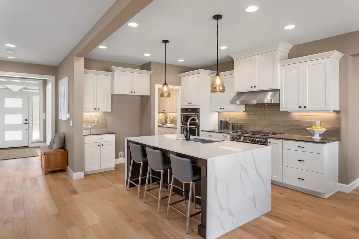 Quartz countertop with a waterfall edge on a kitchen island
