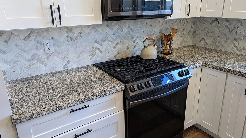 kitchen with mountain storm granite countertop