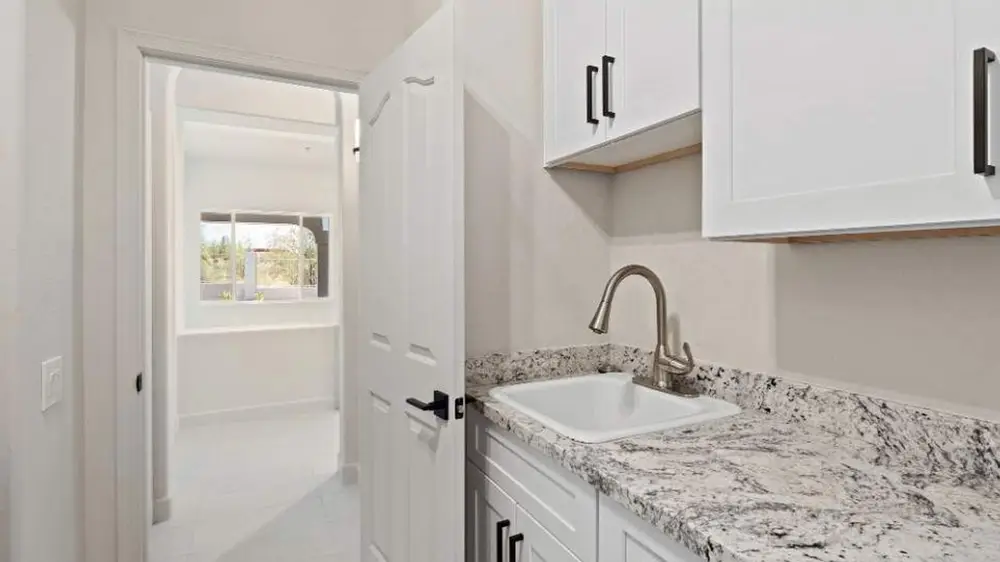 Superior White Shaker Cabinets in Laundry room