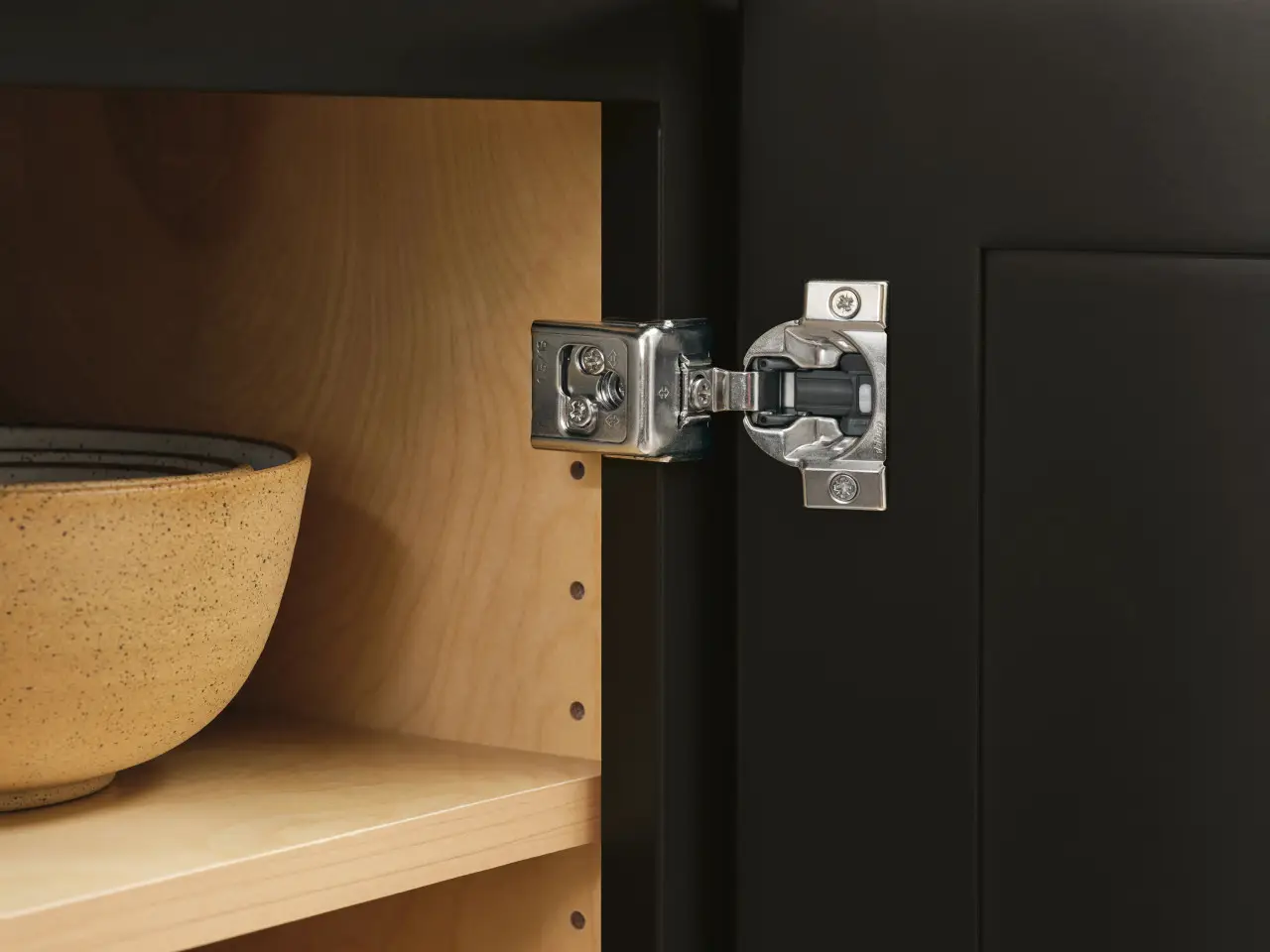 KraftMaid Whisper Touch soft-close hinge