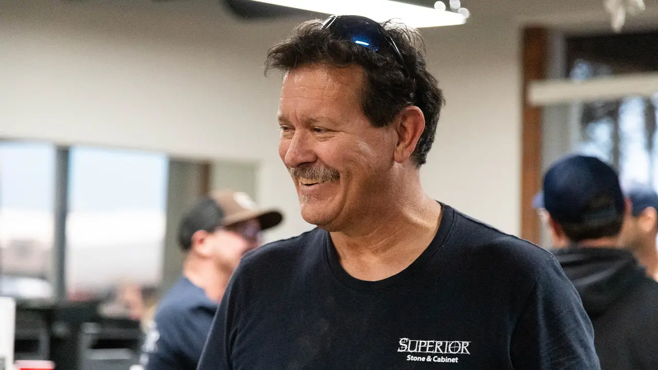 A smiling Superior team member