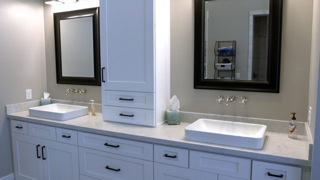 A quartz countertop is a great choice for a bathroom to protect from makeup stains.